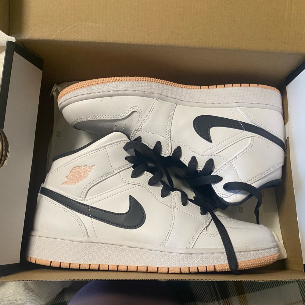 white, gray and pink jordan mids